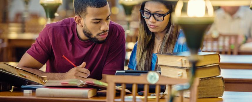 Image of students studying in library 