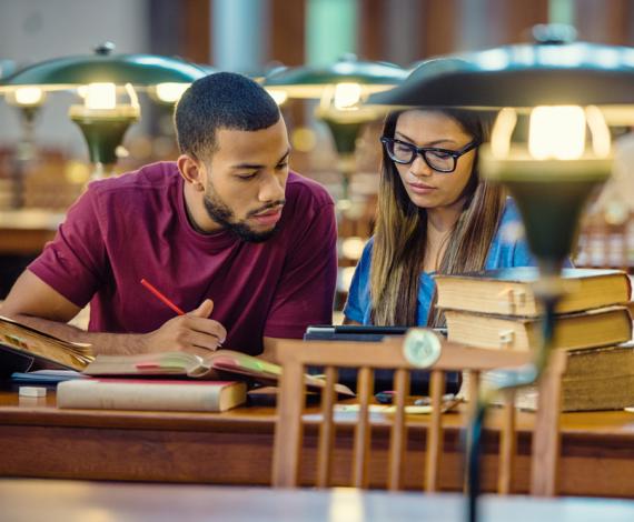 Image of students studying in library 